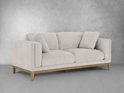 Canapé en tissu Renee avec base en bois, gris clair